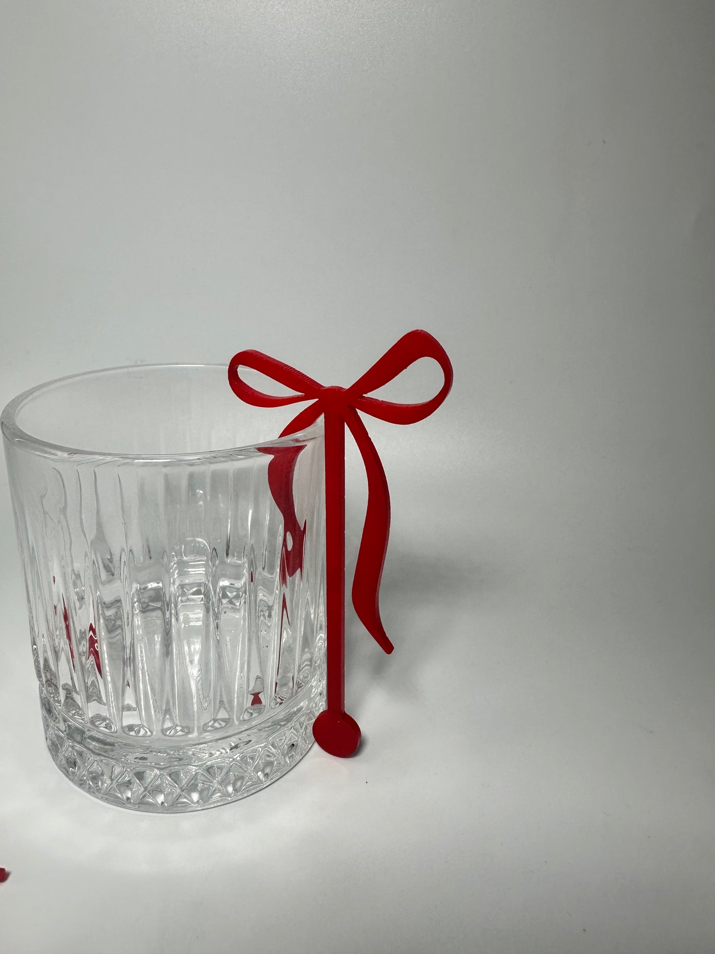 Acrylic bow stirrers, drink stirrers for party, party decor, a tini bit older, party ideas, elegant party decor, bachelorette party decor, classy drink stirrers, how to upgrade a party, instant party upgrades, easy party decor, baby shower decor, anniversary, martini party themed decor, Atlanta party decor, party favors, girl dinner ideas, coquette themed birthday, baby shower decor, red bow drink stirrers, red party decor