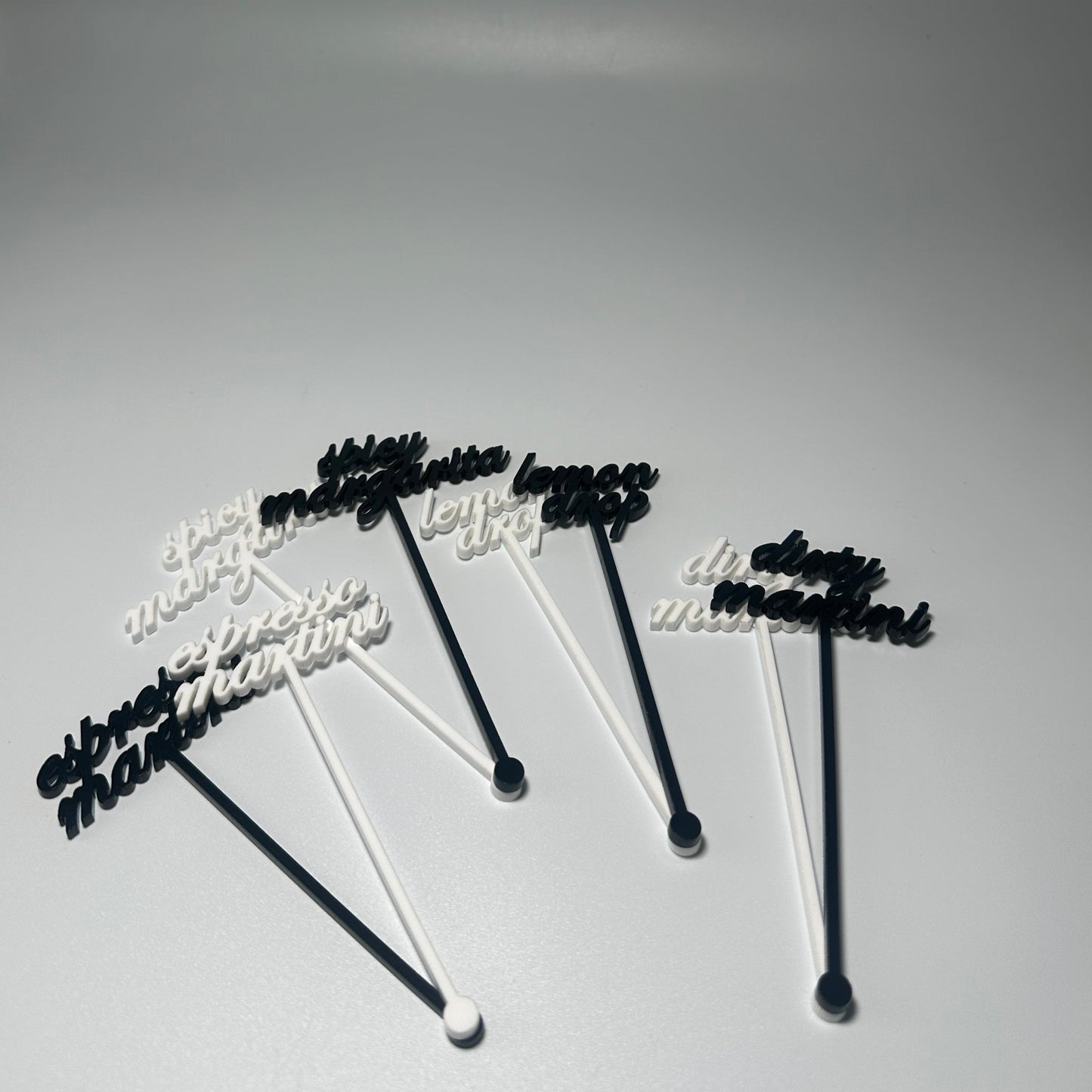 drink name stirrers, party decor, custom acrylic drink stirrers white drink stirrers with espresso martini cut out, espresso martini drink stirrers, martini themed party decor, martini themed party, classy drink decor, drink accessories, drink tags, martini party, minimalist party decor, party vendor atlanta, party vendor miami, acrylic sign vendor, swizzle sticks, mobile bartender set up, mobile bartender must haves, elevate your bar set up