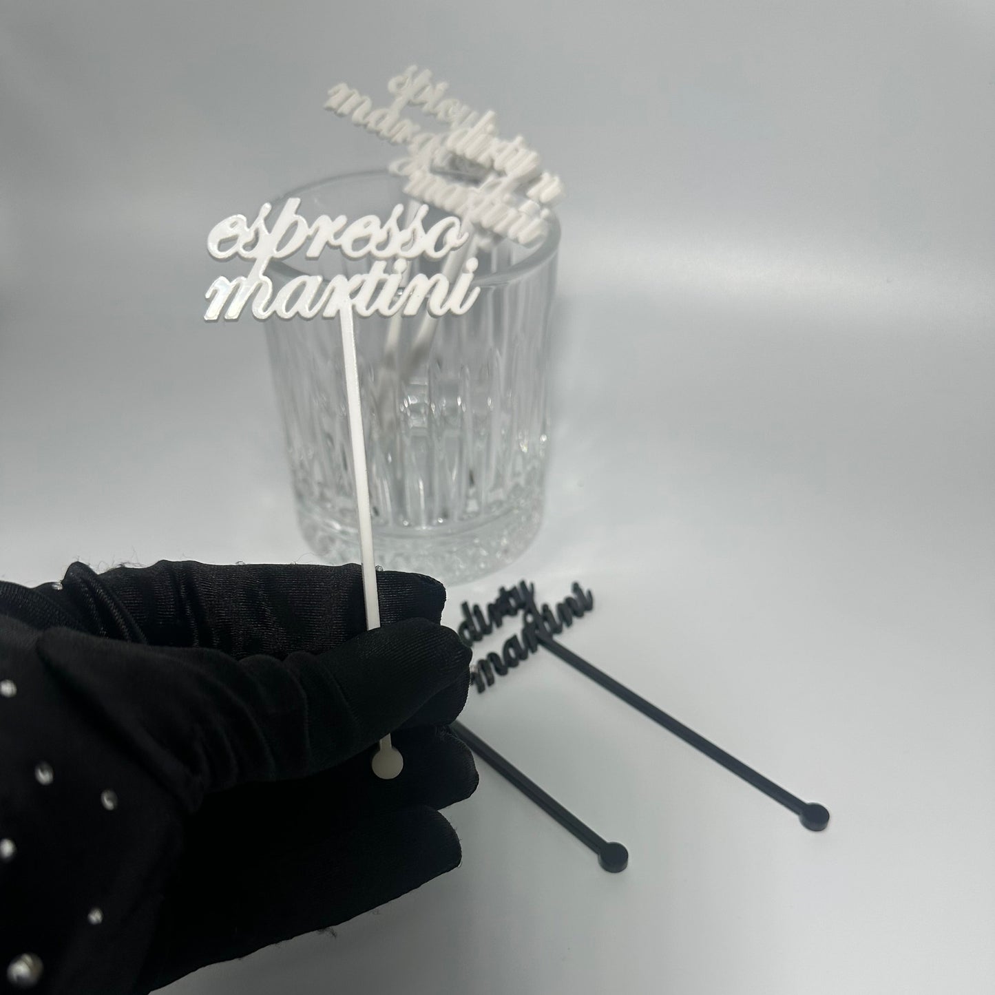 drink name stirrers, party decor, custom acrylic drink stirrers white drink stirrers with espresso martini cut out, espresso martini drink stirrers, martini themed party decor, martini themed party, classy drink decor, drink accessories, drink tags, martini party, minimalist party decor, party vendor atlanta, party vendor miami, acrylic sign vendor, swizzle sticks, mobile bartender set up, mobile bartender must haves, elevate your bar set up