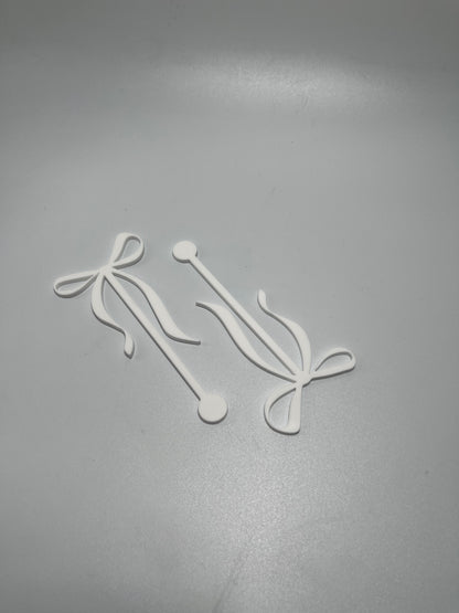 Acrylic bow stirrers, drink stirrers for party, party decor, a tini bit older, party ideas, elegant party decor, bachelorette party decor, black tie event, classy drink stirrers, how to upgrade a party, instant party upgrades, easy party decor, baby shower decor, anniversary, martini party themed decor