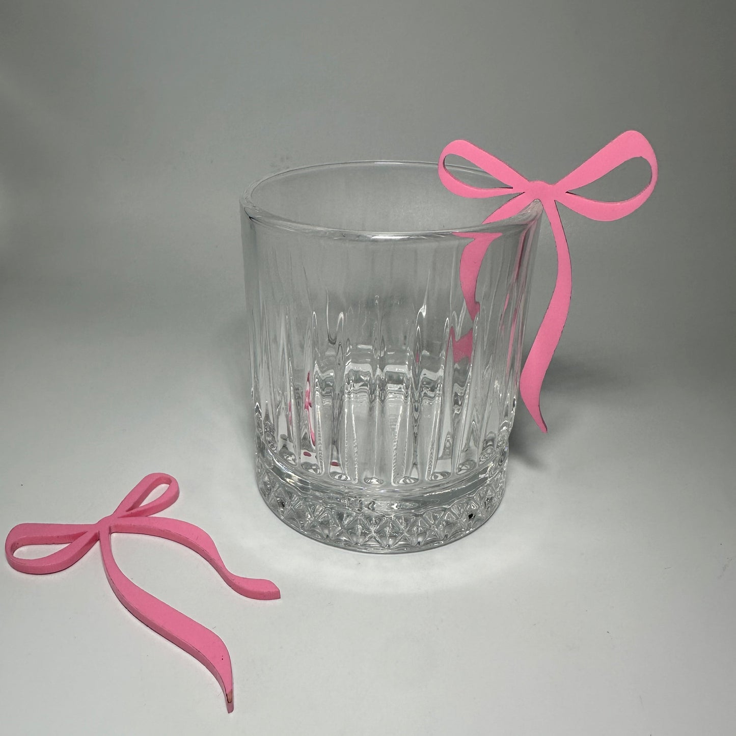 bow drink tags, bow decor, black bow party decor, party decor, a tini bit older decor, acrylic bow drink tags, drink tags for parties, graduation season, party favors, bachelorette party decor, pink party decor, party store in atlanta