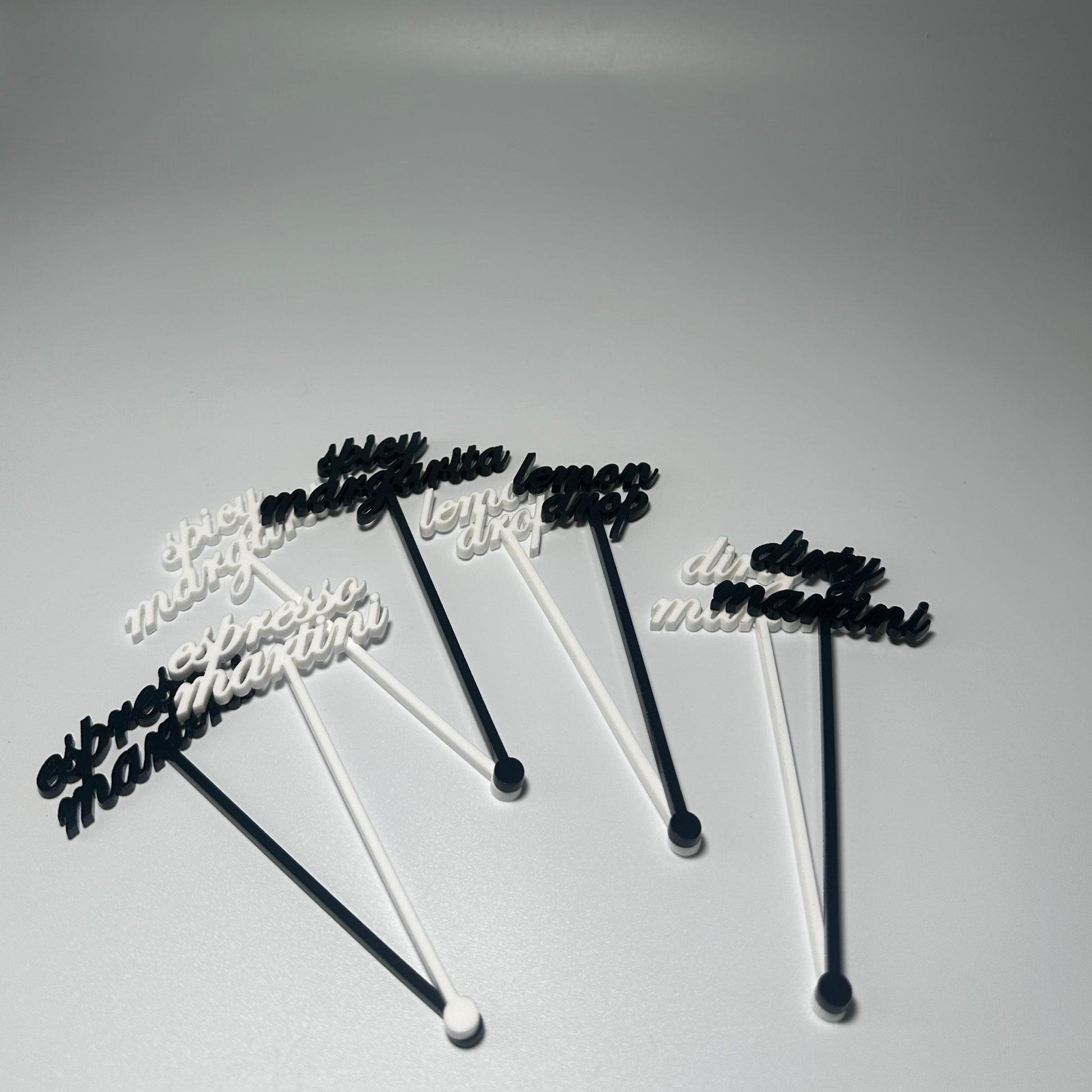 drink name stirrers, party decor, custom acrylic drink stirrers white drink stirrers with espresso martini cut out, espresso martini drink stirrers, martini themed party decor, martini themed party, classy drink decor, drink accessories, drink tags, martini party, minimalist party decor, party vendor atlanta, party vendor miami, acrylic sign vendor, swizzle sticks, mobile bartender set up, mobile bartender must haves, elevate your bar set up