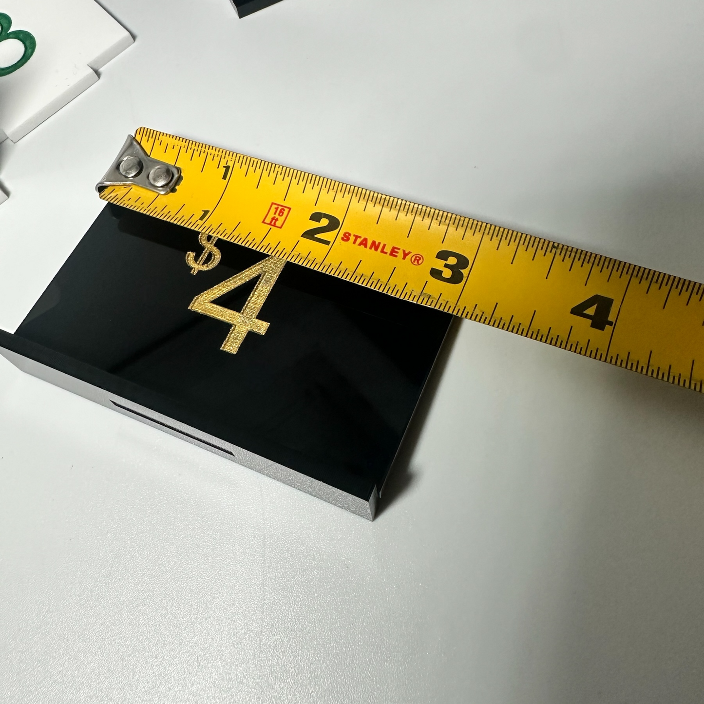 white retail display labels, acrylic retail labels, mini price signs for boutiques, boutique price labels, custom pricing signs, lioness engraving signs, lioness engraving, store set up essentials, black retail display labels, reusable sale signage, opening up a store, bakery retail sign, 