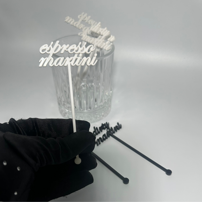 drink name stirrers, party decor, custom acrylic drink stirrers white drink stirrers with espresso martini cut out, espresso martini drink stirrers, martini themed party decor, martini themed party, classy drink decor, drink accessories, drink tags, martini party, minimalist party decor, party vendor atlanta, party vendor miami, acrylic sign vendor, swizzle sticks, mobile bartender set up, mobile bartender must haves, elevate your bar set up