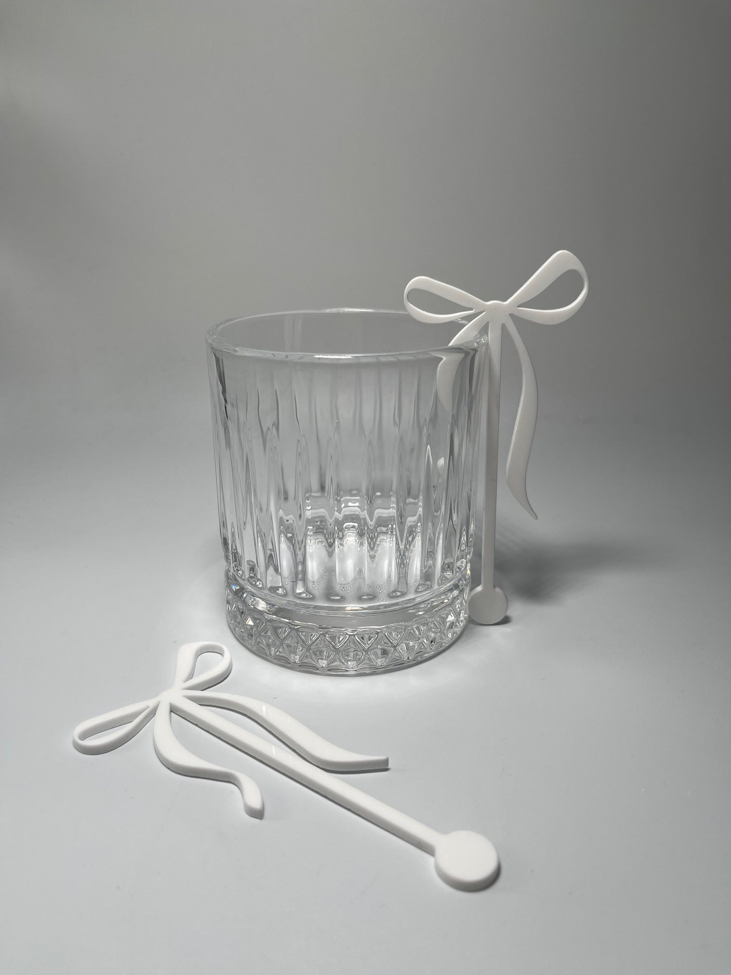 Acrylic bow stirrers, drink stirrers for party, party decor, a tini bit older, party ideas, elegant party decor, bachelorette party decor, black tie event, classy drink stirrers, how to upgrade a party, instant party upgrades, easy party decor, baby shower decor, anniversary, martini party themed decor, Atlanta party decor, party favors, girl dinner ideas, coquette themed birthday, baby shower decor