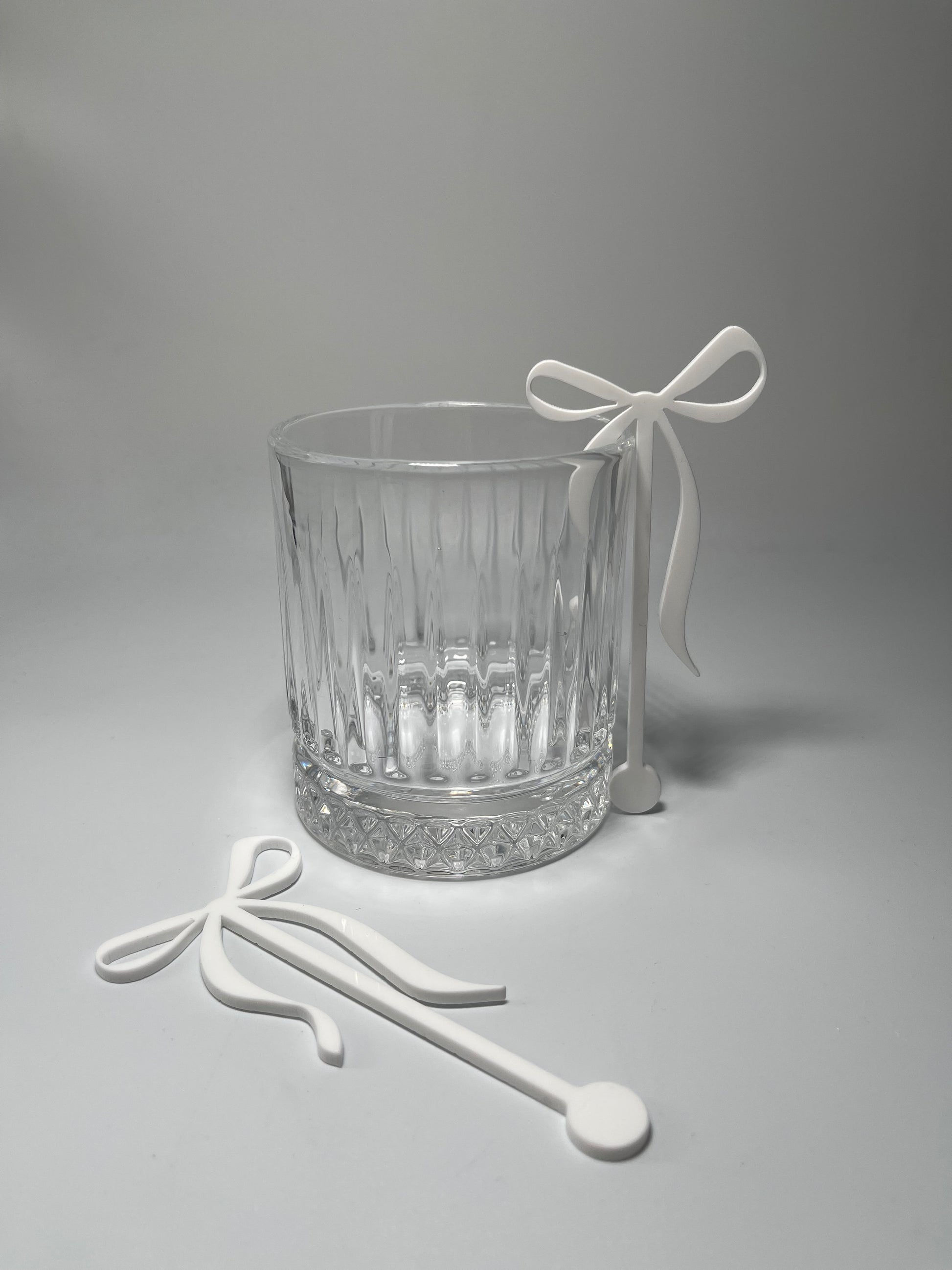 Acrylic bow stirrers, drink stirrers for party, party decor, a tini bit older, party ideas, elegant party decor, bachelorette party decor, black tie event, classy drink stirrers, how to upgrade a party, instant party upgrades, easy party decor, baby shower decor, anniversary, martini party themed decor, Atlanta party decor, party favors, girl dinner ideas, coquette themed birthday, baby shower decor